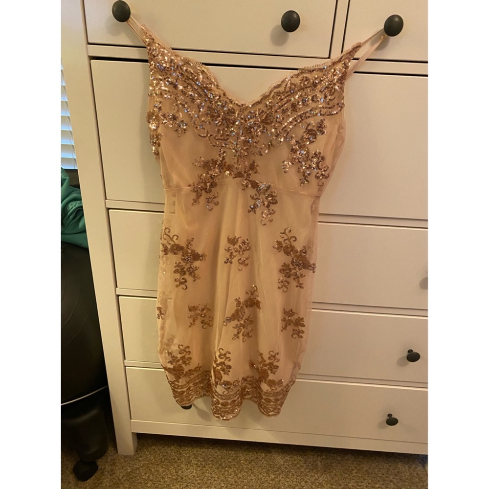 Elegant gold embellished dress.